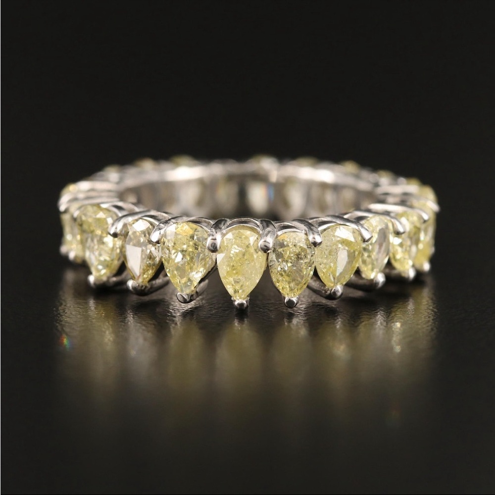 4.0+ carat pear shaped fancy yellow band diamond